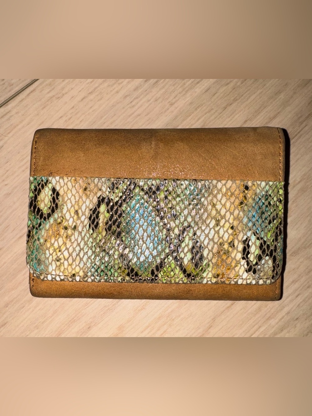 HOBO trifold wallet smooth tan leather featuring multicolored faux snakeskin